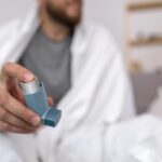 A man guiding about asthma devices