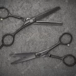 barber-professional-tools-haircut-fashion-pair-professional-haircutting-scissors-black-backgroud_275