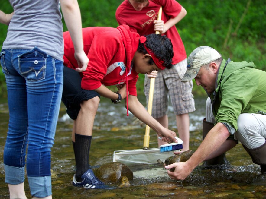 People monitoring the water