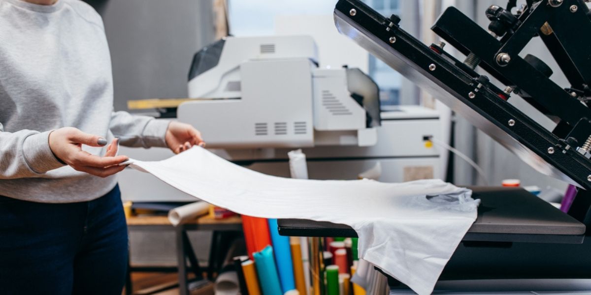 printing images on white t-shirt at fabric.