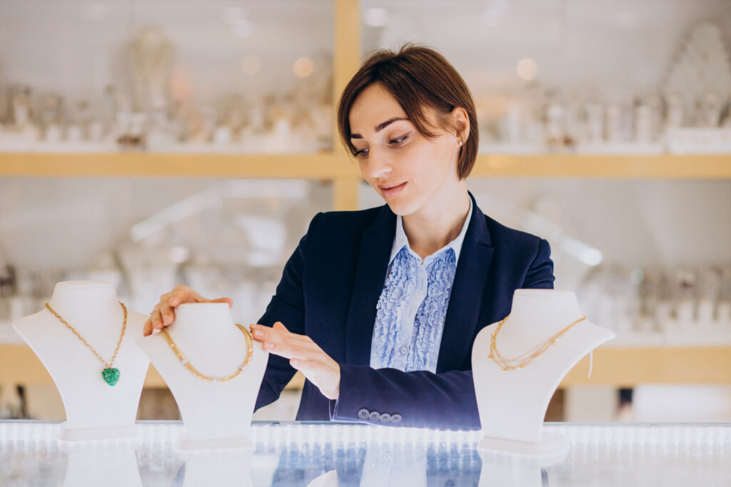 Female sales person at jewelry shop