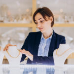 Female sales person at jewelry shop