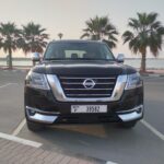 Why is renting a car in Dubai a popular choice for travelers