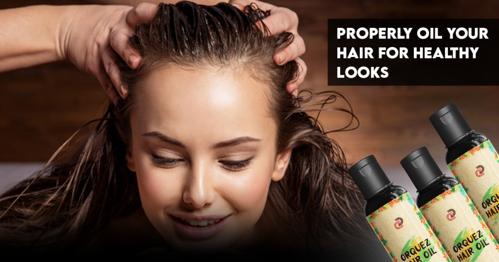 Assortment of hair care products including nourishing oils, strengthening shampoos, and finishing sprays arranged neatly on a wooden surface, symbolizing a comprehensive hair care routine for achieving healthy, lustrous locks