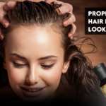 Assortment of hair care products including nourishing oils, strengthening shampoos, and finishing sprays arranged neatly on a wooden surface, symbolizing a comprehensive hair care routine for achieving healthy, lustrous locks