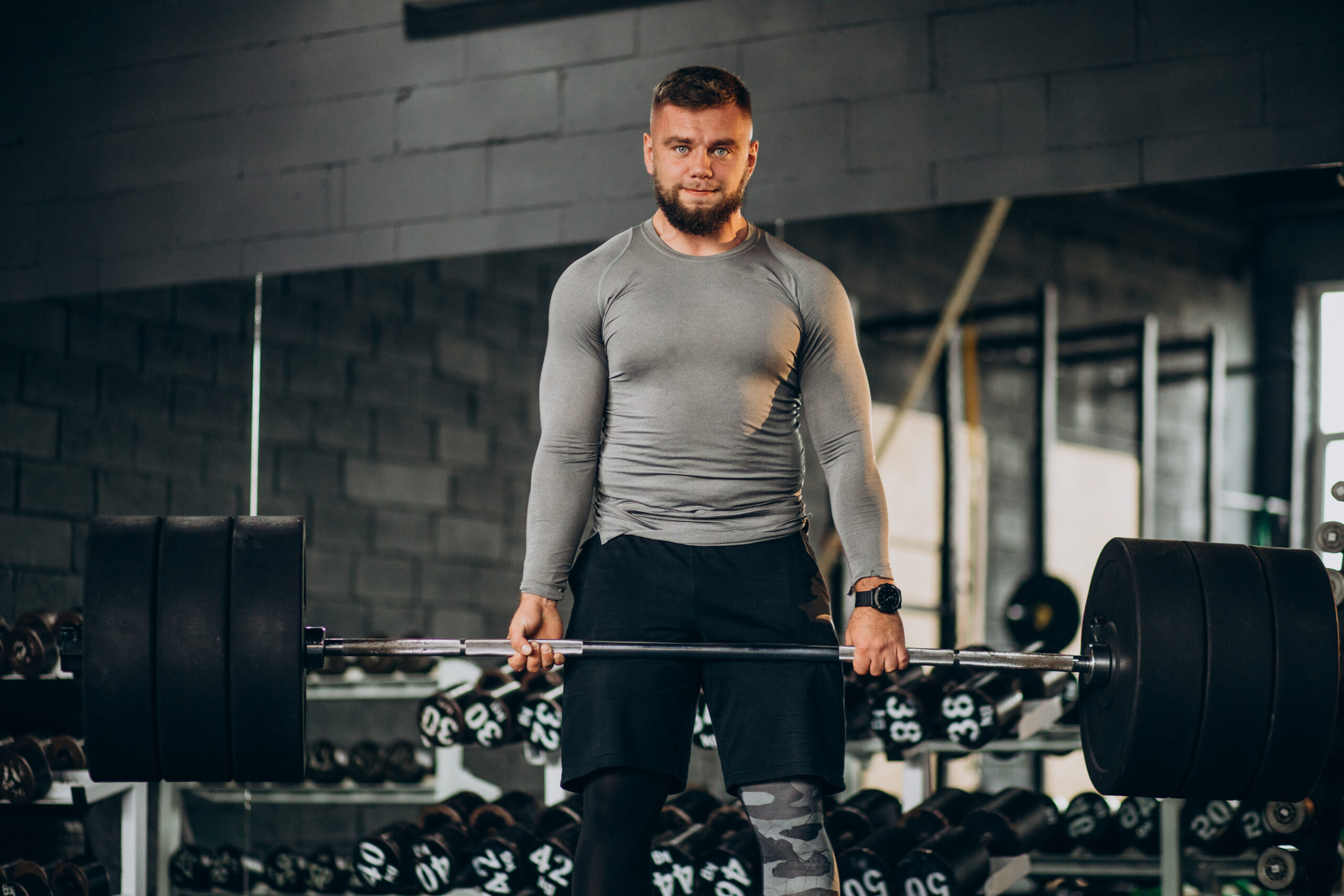 Strong man exercising at the gym