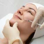 A lady while treatment with Botox injections in NYC