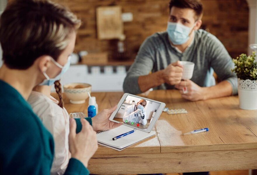 closeup-black-doctor-having-video-call-with-family-coronavirus-pandemic