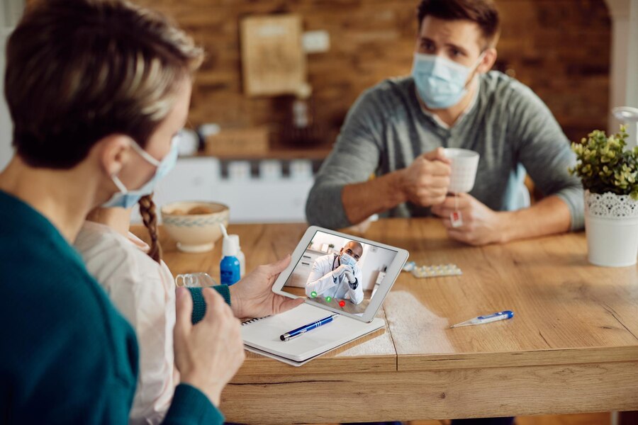 closeup-black-doctor-having-video-call-with-family-coronavirus-pandemic